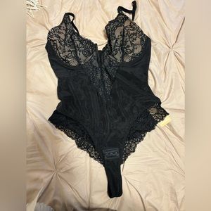 Bodysuit Popilush new tags still on.